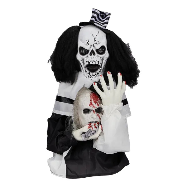 Sound-activated clown Halloween prop with glowing red LED eyes — mid-bounce