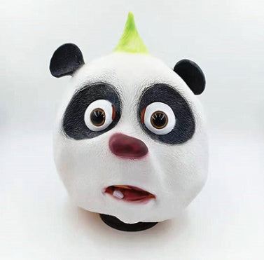 Punk panda mask close-up — wide latex eyes and open mouth capture the mask's deadpan humor