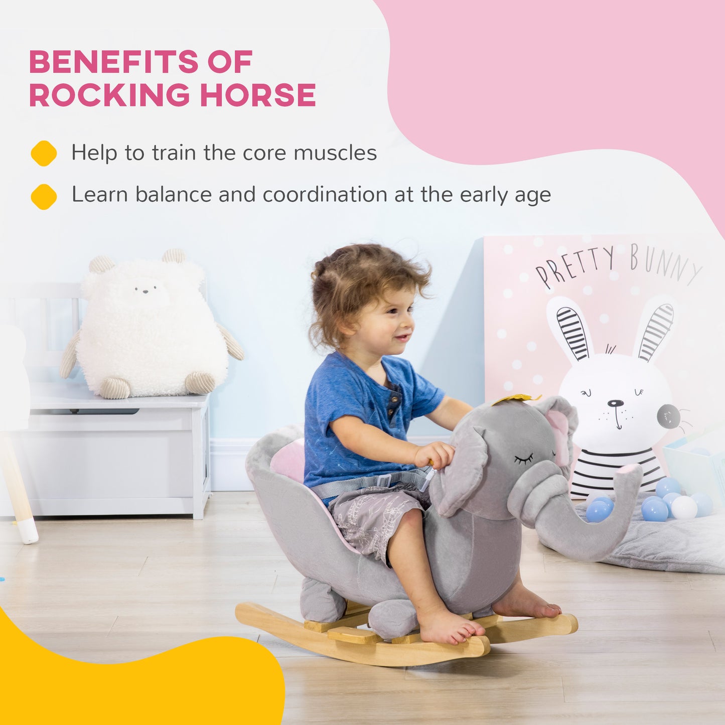 Toddler riding grey elephant rocker — builds balance and core strength early