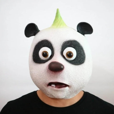 Punk panda latex mask — full-face view, green mohawk, bewildered expression on black tee