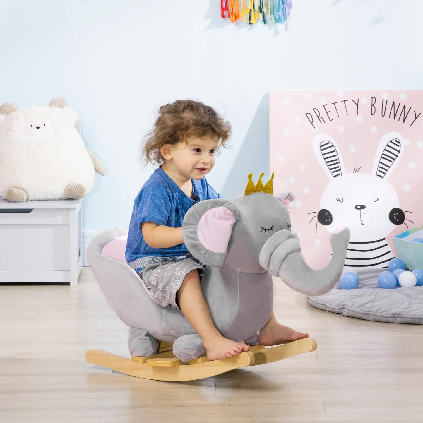 Cupped seat with seatbelt and footrests — safe rocking for 18-36 months