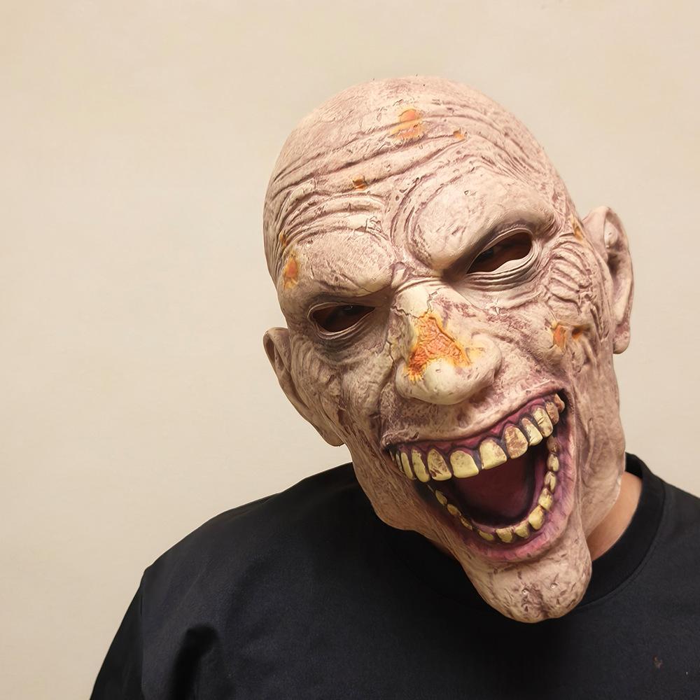 Bald Zombie Mask front-facing close-up — cracked latex, open jaw, Halloween character mask