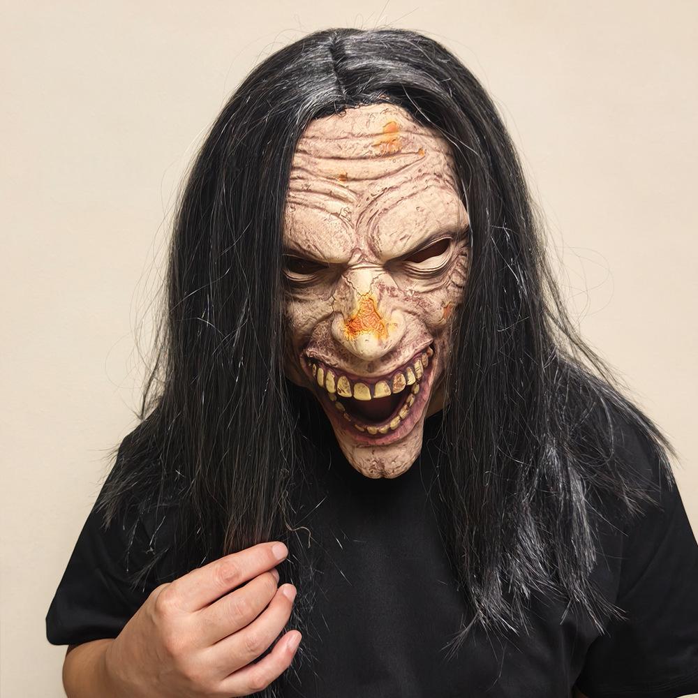 Zombie latex mask close-up — aged latex texture with theatrical detail